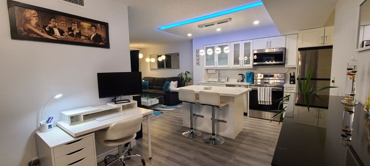 https://d2d56882uwwjpl.cloudfront.net/medium_Den_and_Kitchen_a1c8703357.jpg